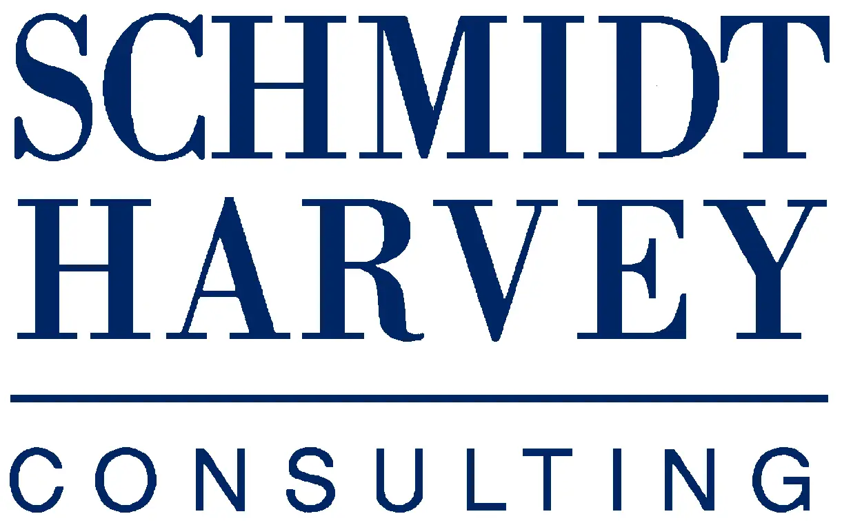 A blue and white logo of schmidt harvey consulting